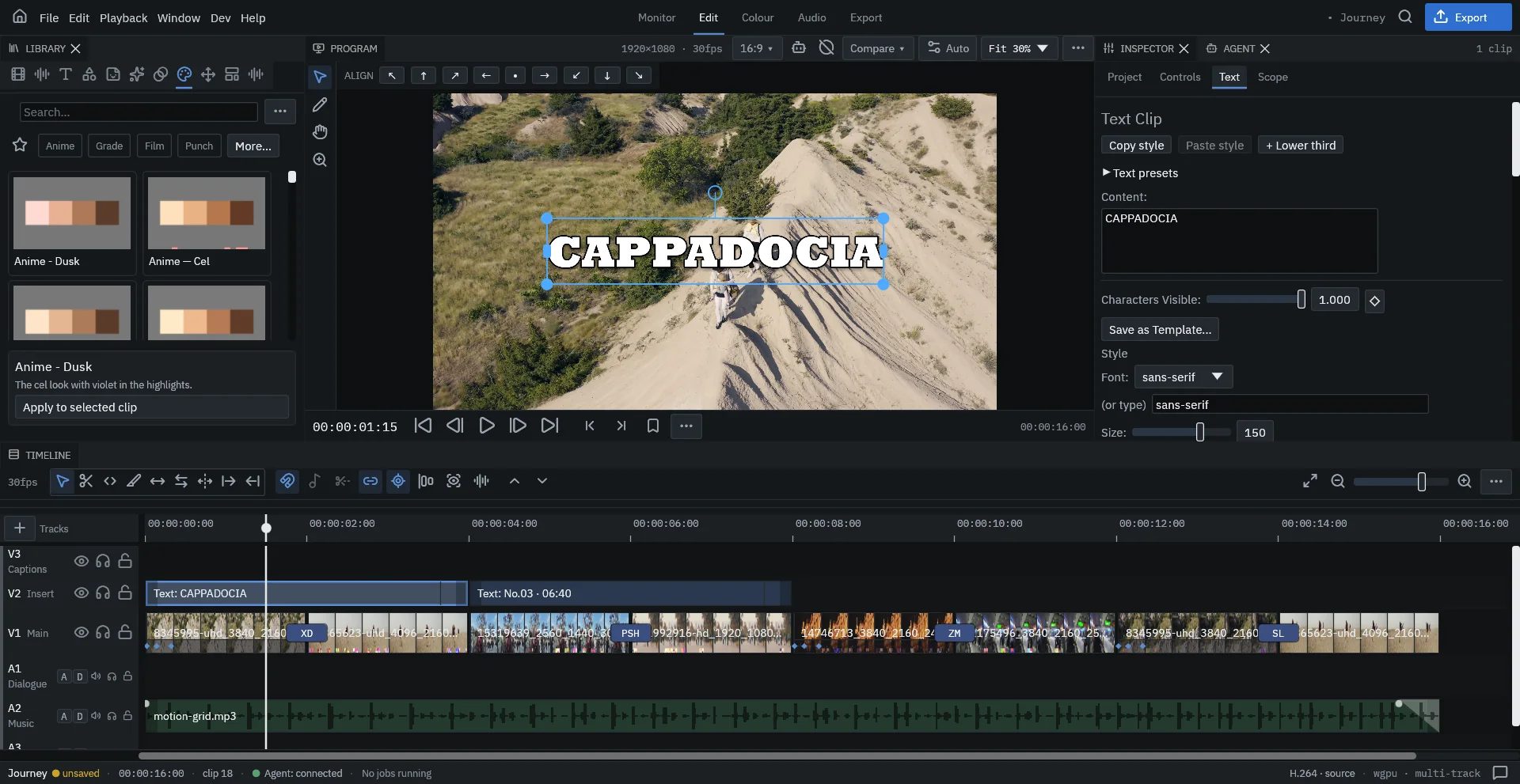 A title selected on the viewer with its handles, and the Text tab of the inspector